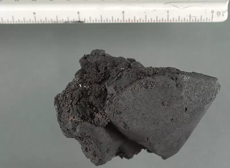 Image: Denver Police seized what looked to be black tar heroin (above), which turned out to be the deadly synthetic opioid fentanyl.