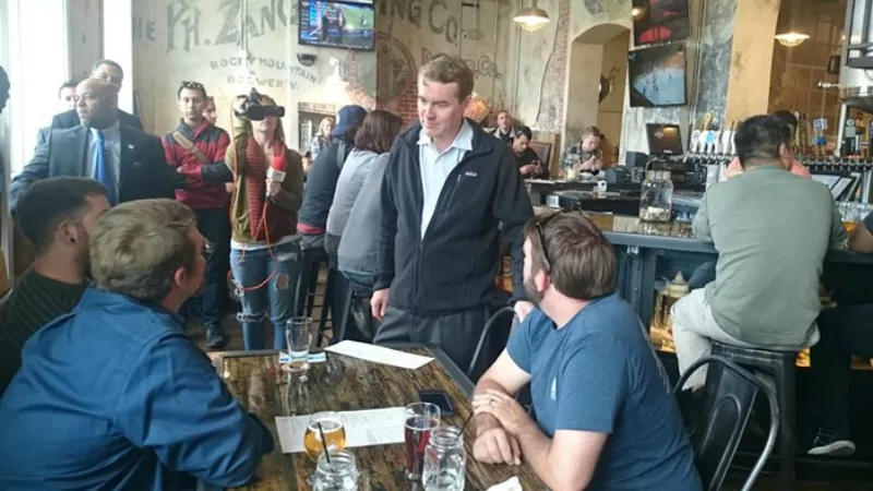 Image: Senator Michael Bennet during an October campaign visit at a Metropolitan State University of Denver watering hole.