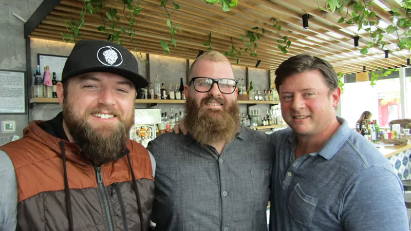 Image: Blake Edmunds (left) and Juan Padro (right) welcome chef Sebastian Ramirez-Lohner to Señor Bear.