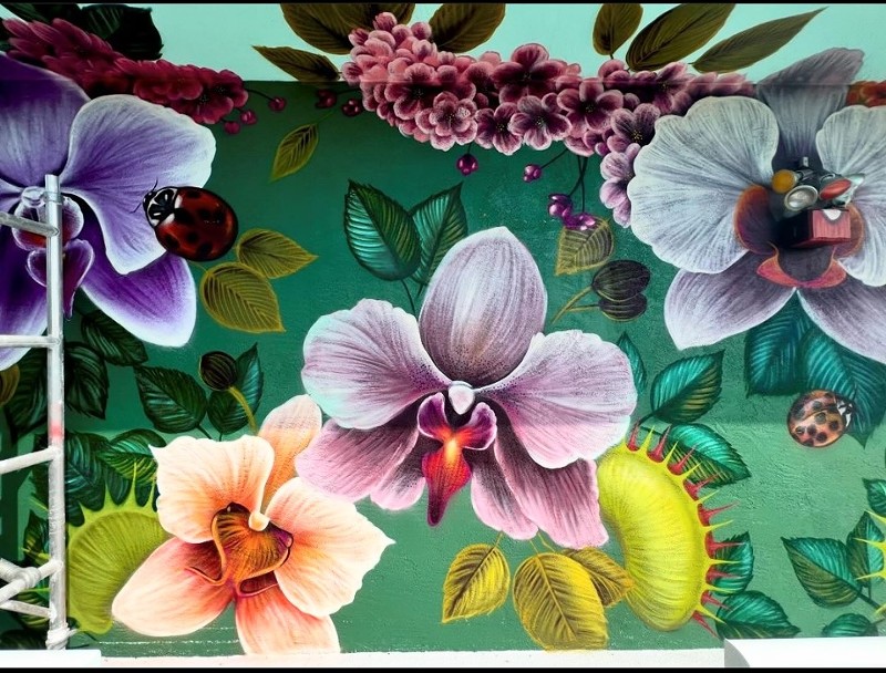 A floral fantasy by Amanda Valdez, one of five muralists showcased in at Alto Gallery.