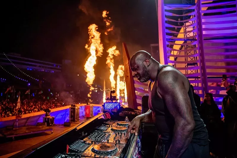 Image: shaq deejaying with fire