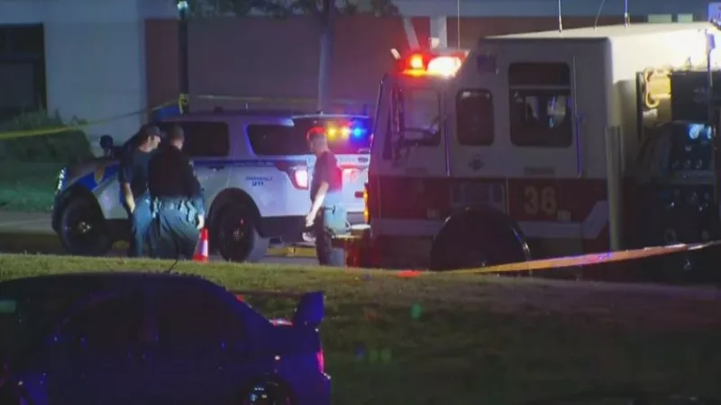 Image: Emergency crews outside Sheridan High School last night.
