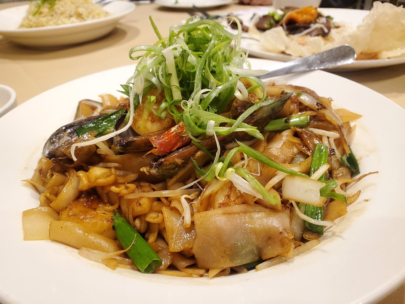 Dry hu tieu noodles with seafood.