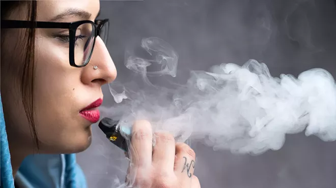 A woman vaping