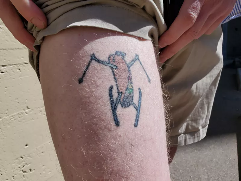 Image: Westword multi-media account executive Tom Anglin's skiiing taco tattoo.
