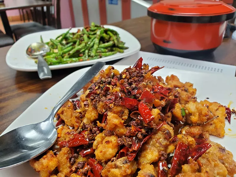 Image: small pieces of fried chicken with chiles