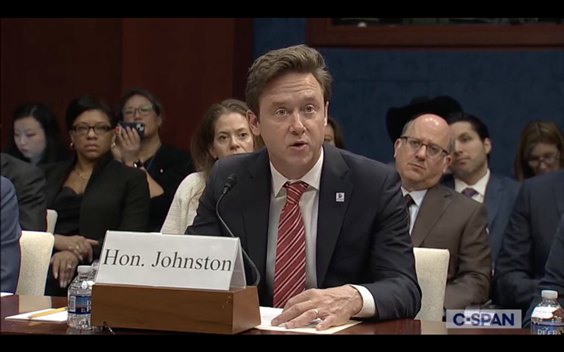 Image: Denver Mayor Mike Johnston addresses the committee.