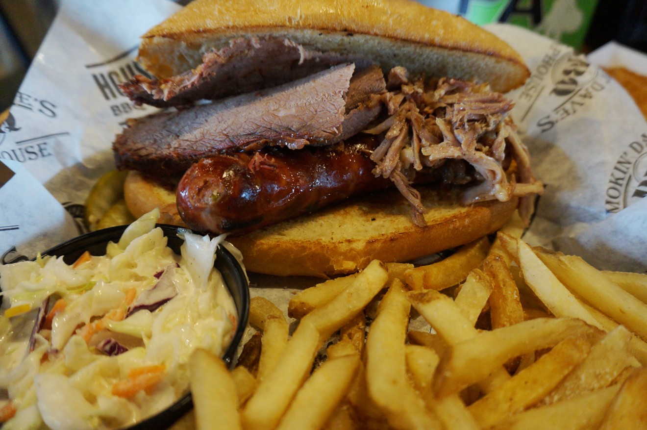 The pit master at Smokin' Dave's combines beef brisket, pulled pork and housemade jalapeño-cheddar sausage.