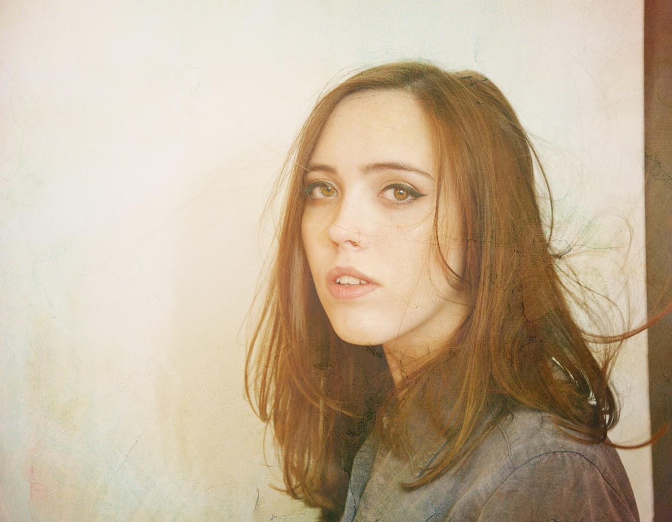 Twenty-one-year-old Sophie Allison makes music as Soccer Mommy.