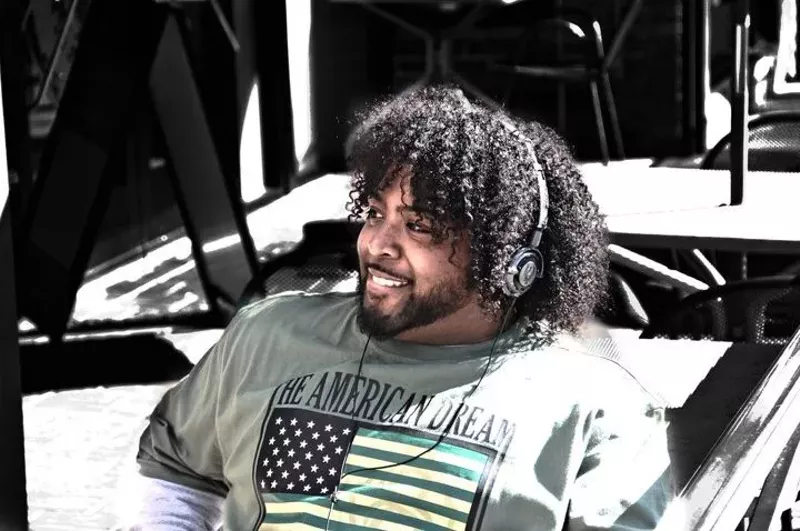Image: Though he never made it to the NFL, Justin Holmes is living out his dreams.