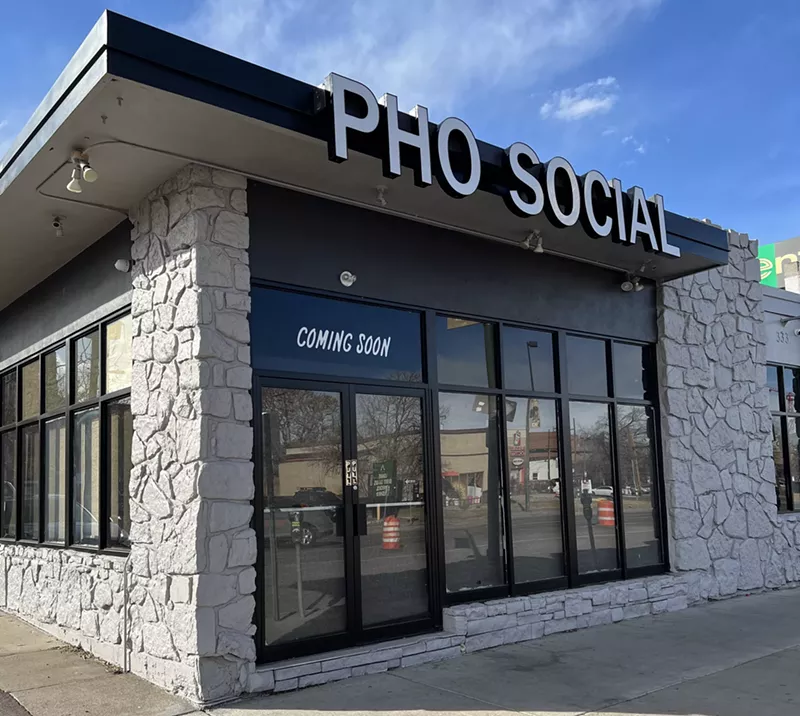 Image: exterior of a building with a "pho social" sign
