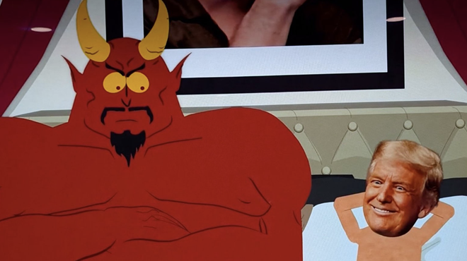 A cartoon of satan and trump in bed