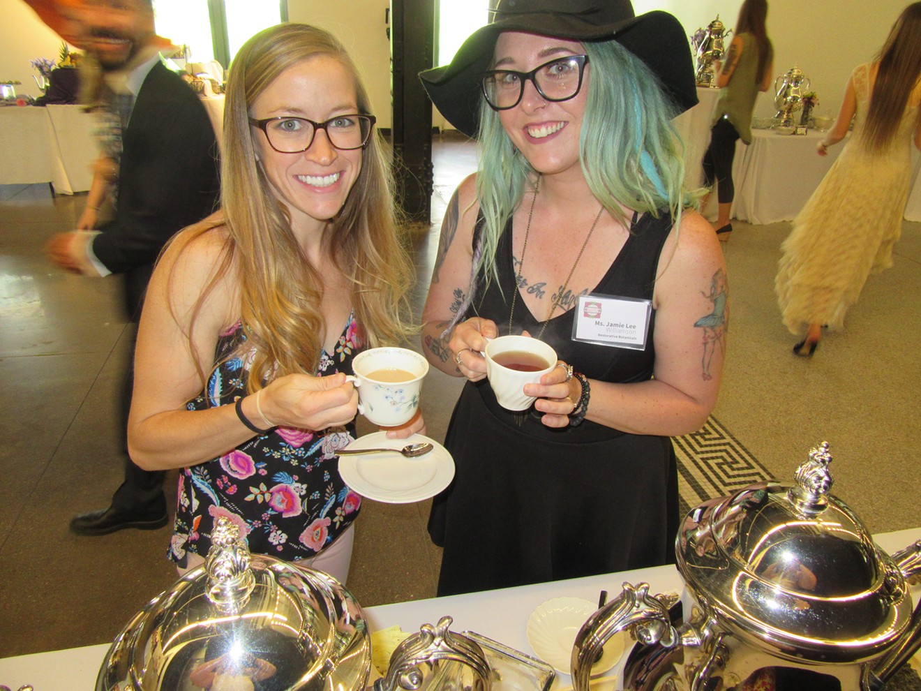 Jamie Lee and Amy Creary of Restorative Botanicals enjoy gourmet tea at the Mother's High Tea on May 12.