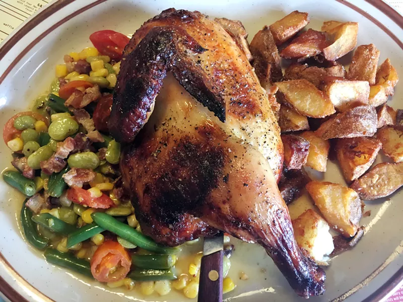 Image: The new half brick chicken at Steuben's, served with crispy potatoes and succotash.