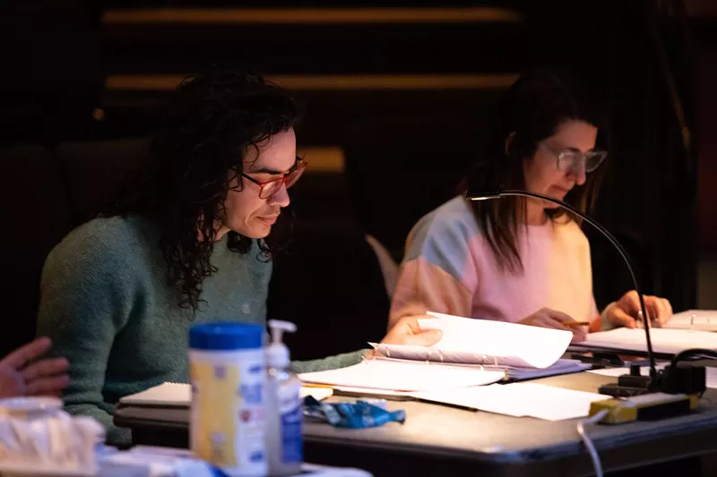 Image: people reading scripts