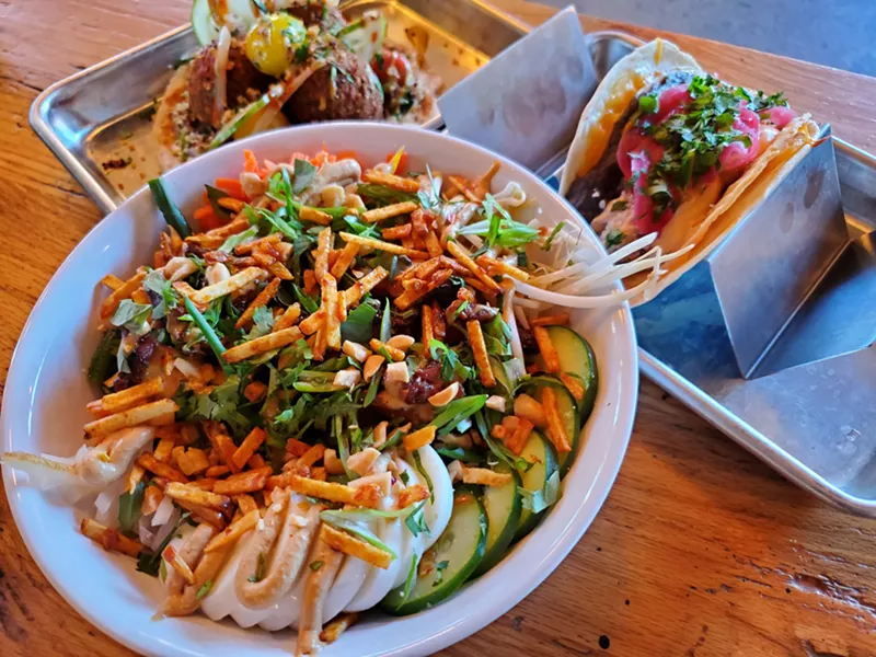 Image: The chicken satay noodle bowl is loaded with veggies.