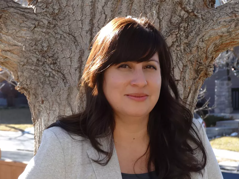 Image: Commerce City nurse Darci Martinez is worried about air quality as a result of harmful Suncor oil refinery operations.
