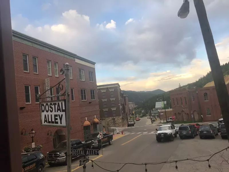 Image: The view from Dostal Alley in Central City. Dostal Alley is still keeping neighbors fed with pizza and beer.