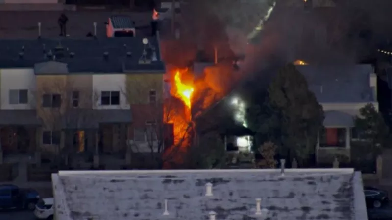 Image: A view of the fire that broke out at the 6th and Inca residence during the standoff.