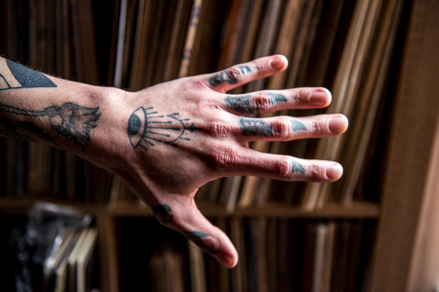 Bass Guitarist tattoos bald man muscle musician Stock Photo - Alamy