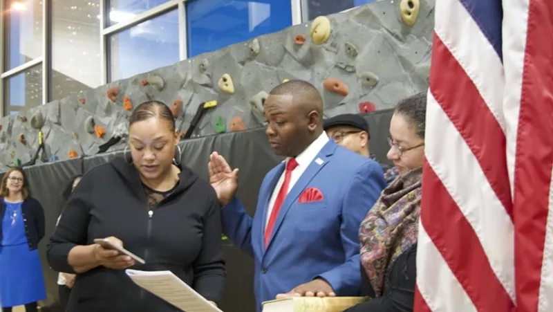 Image: Tay Anderson was sworn in as a member of the Denver School Board by his mother during a December 2019 ceremony.