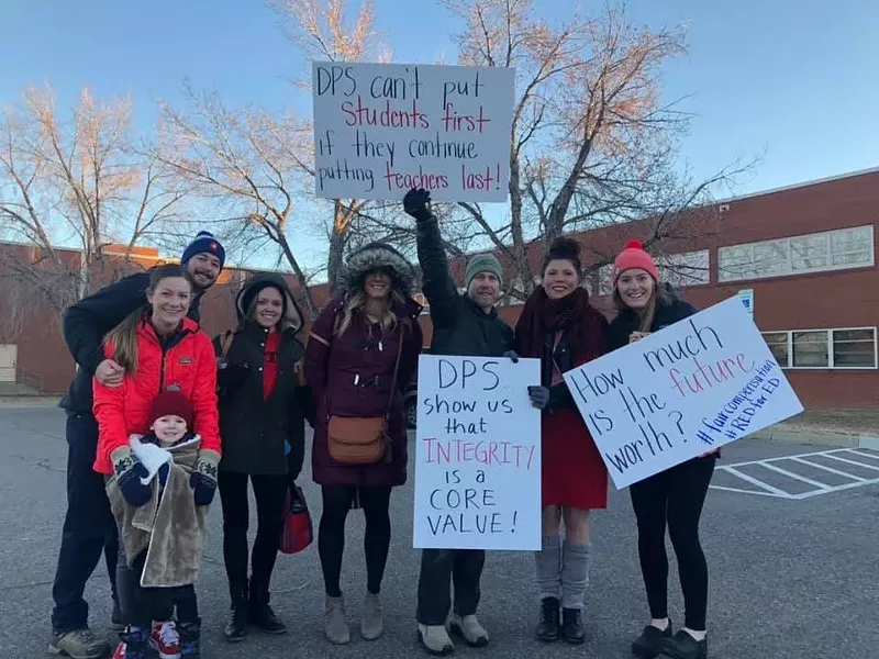 Image: Teachers outside Columbine Elementary School on the morning of January 14.
