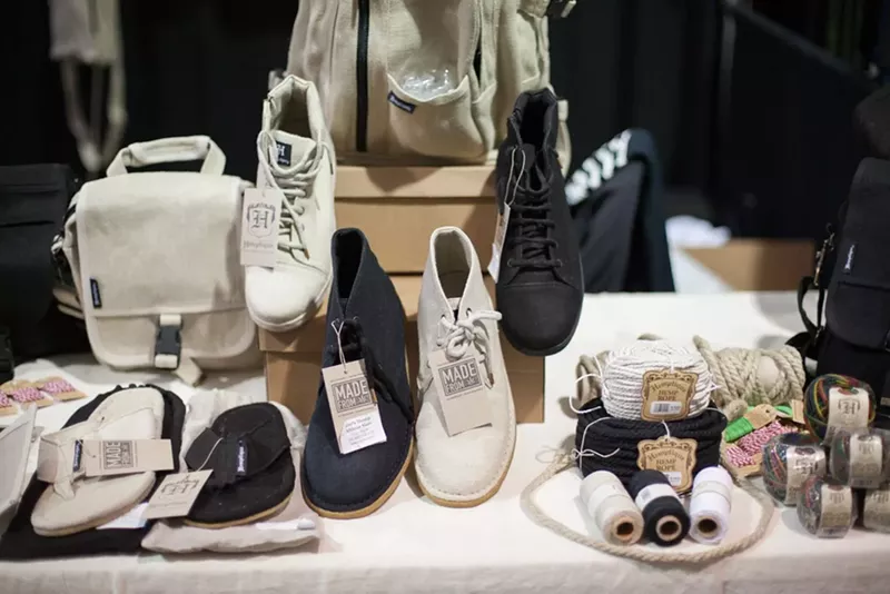 Image: A wide selection of shoes are on display at a store.