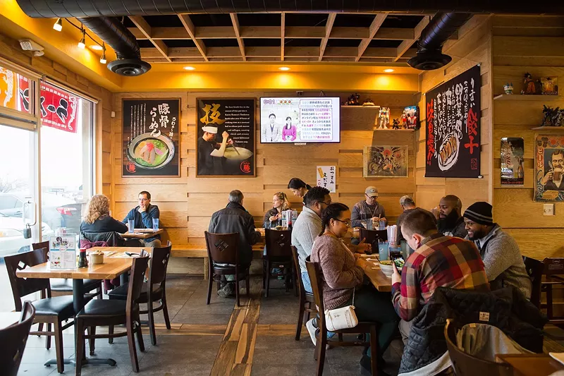 Image: people inside a ramen shop