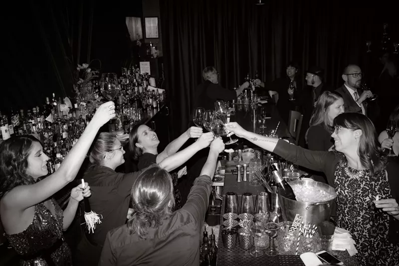 Image: Welcome the Roaring (20)20s with classy black-and-white photos of your NYE party.