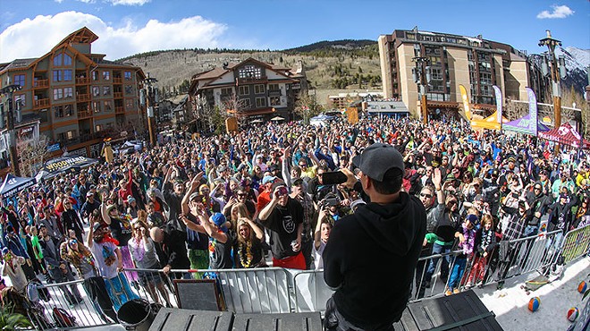 band in front of crowds at ski resort