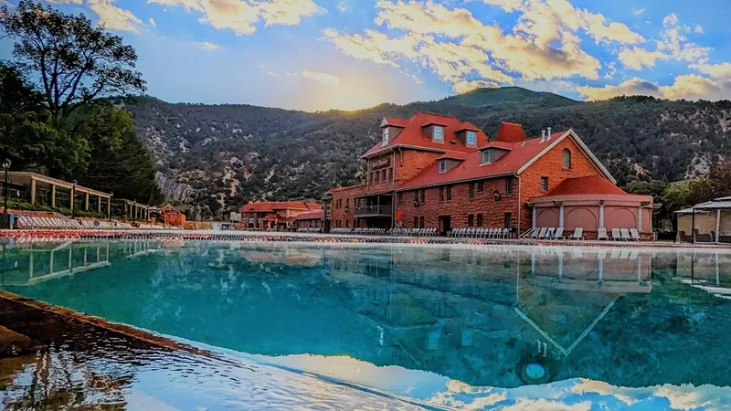 Image: Blue water with mountains in the background