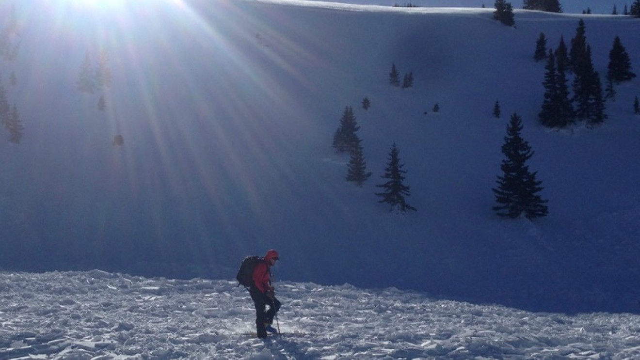An observer checks out an avalanche that occurred in the Sawatch Range on March 7.