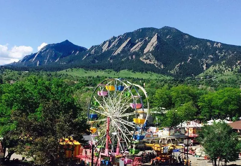 Image: Boulder Creek Festival's Ferris wheel isn't quite as tall as the Flatirons.