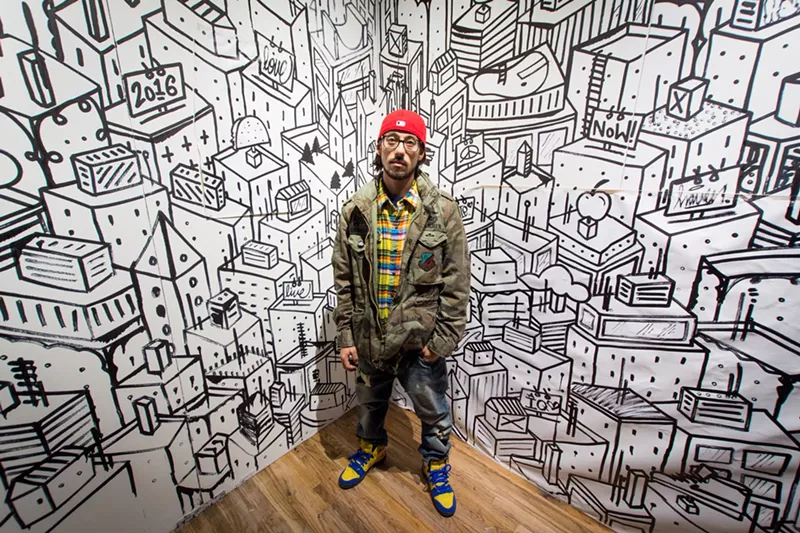 Image: Artist Chris Haven at Artopia 2016.