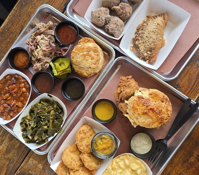 Image: barbecue meat and sides on trays