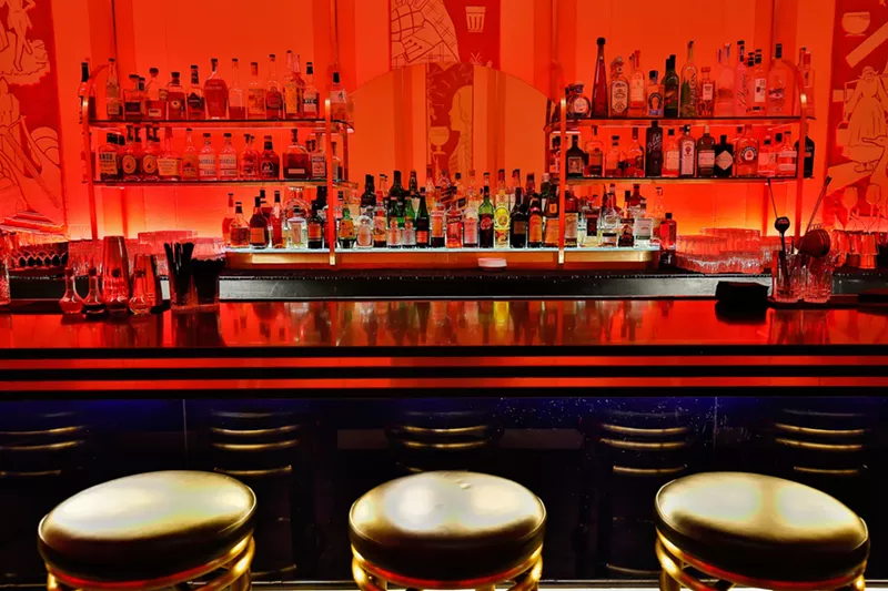 Image: a bar with red lighting