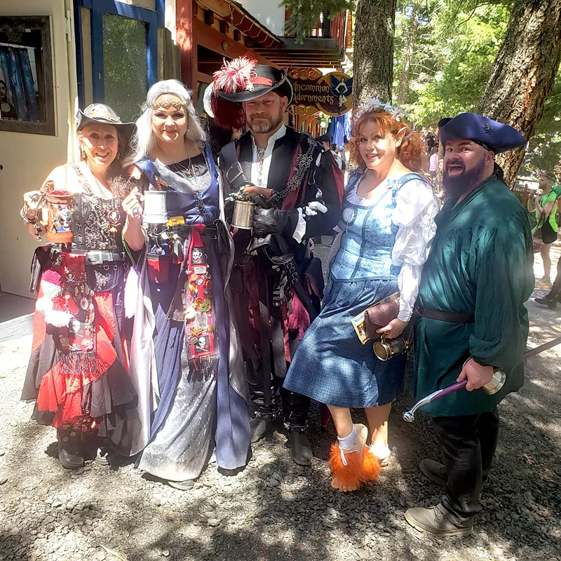 Image: A group of people in Renaissance Festival outfits.