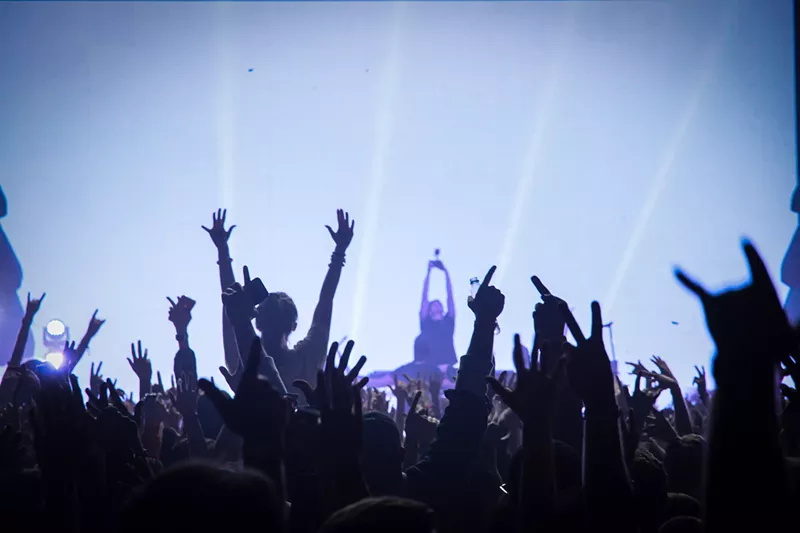 Image: fans in a music venue