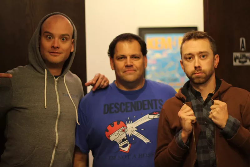 Image: From left: Matt Skiba (Alkaline Trio), Bill Stevenson and Tim McIlrath (Rise Against) pose for a photo at the Blasting Room.