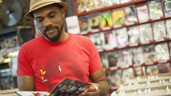 A man flips through a book