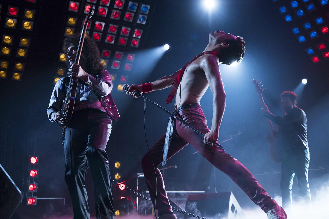 Rami Malek delivers as Queen showman Freddie Mercury, with Gwilym Lee (left) and Joe Mazzello (right) playing bandmates Brian May and John Deacon, respectively, in the rock biopic Bohemian Rhapsody.