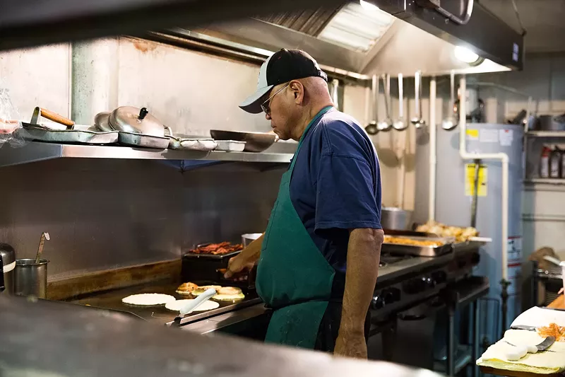 Image: Rodney Okuno could often be seen cooking breakfast at his downtown eatery.