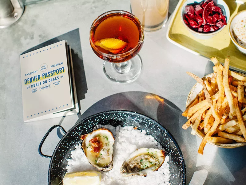 Image: a small booklet on a table with oysters, fries and cocktails