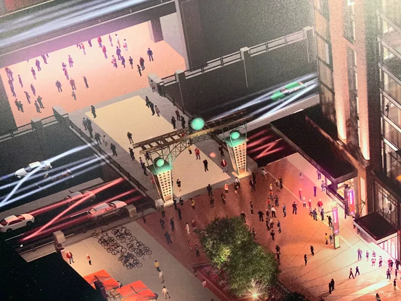 Image: Yes, that's Lonnie Hanzon's "The Evolution of the Ball" at the edge of McGregor Square.