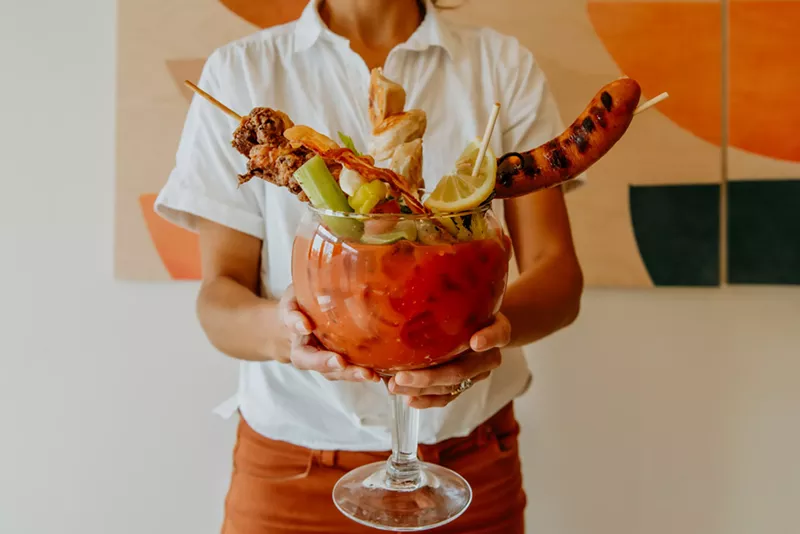 Image: Why, yes, that is a sausage in my Bloody Mary. And I'm happy to see you, too.
