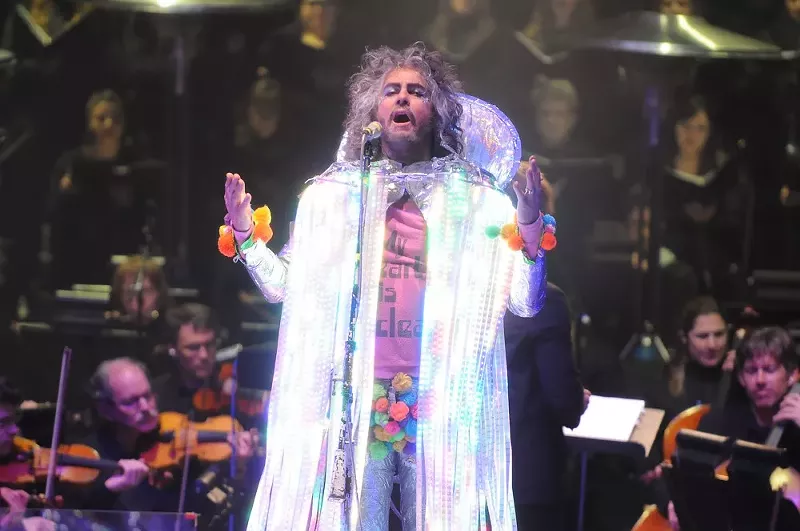 Image: Wayne Coyne of the Flaming Lips performing with the Colorado Symphony at Red Rocks Amphitheatre on May 26, 2016.