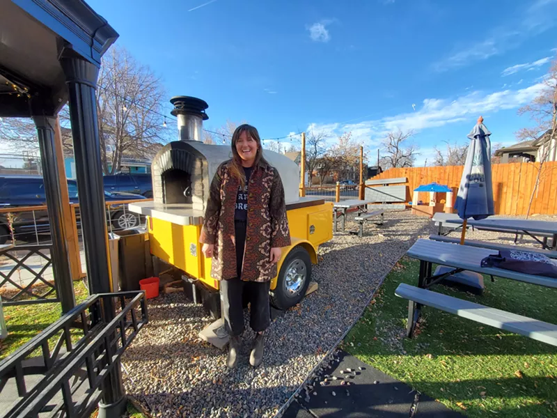 Image: Allison Declercq with the oven that's help her build the Funky Flame.