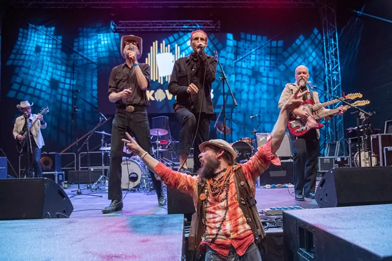 Image: band performing on stage