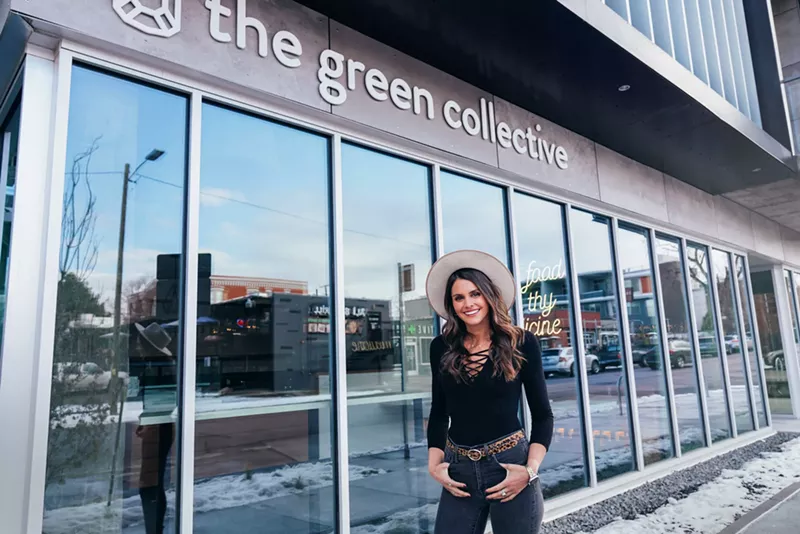 Image: Allison Rifkin stands in front of the Green Collective, which opened this week.