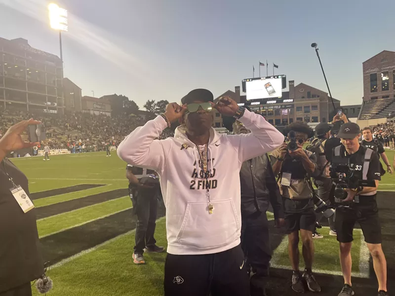 Image: Deion Sanders putting his sunglasses on before the game against Colorado State University on Septemver 16.